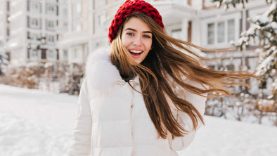 Girl in the winter snow with Beautiful hair 