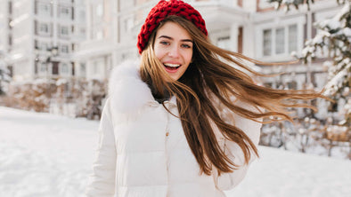 Girl in the winter snow with Beautiful hair 